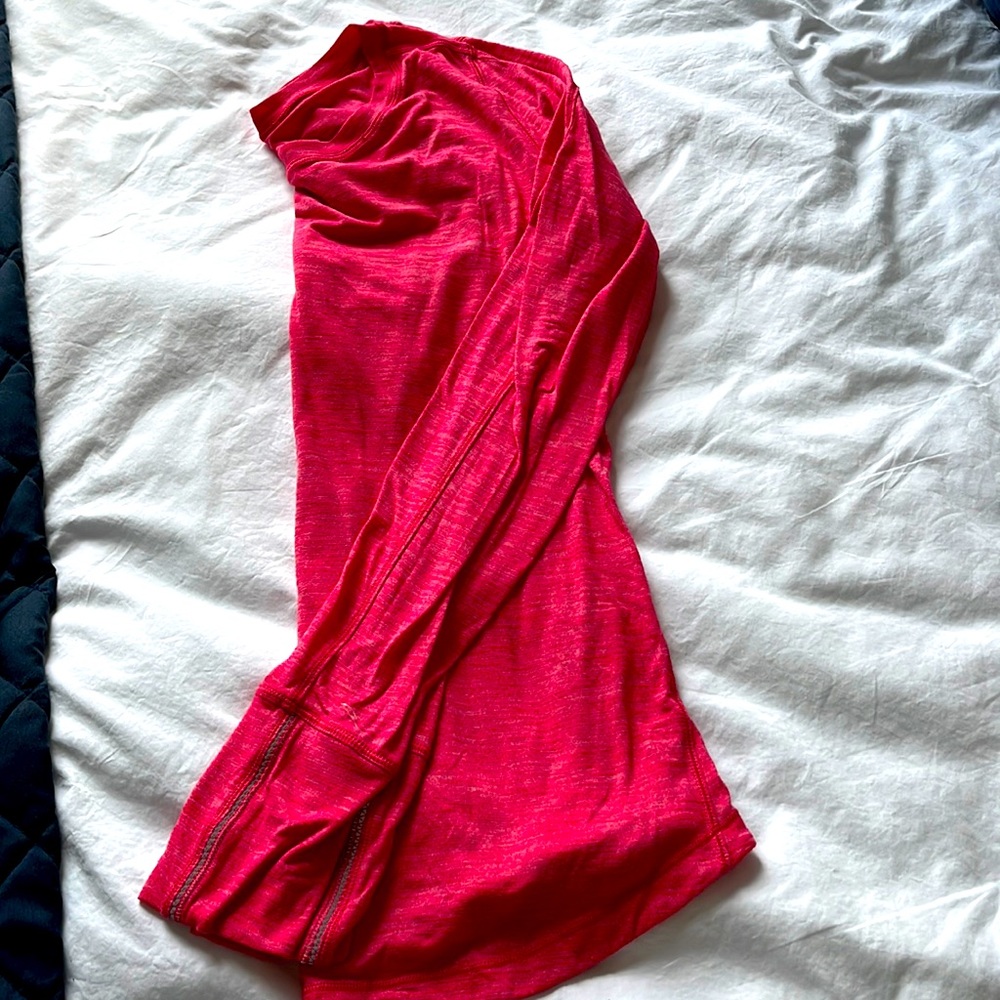 Lululemon size 10 long sleeve top.   Amazing color and looks brand new!